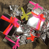 Gift Wrapping - silver foil / neon ribbon